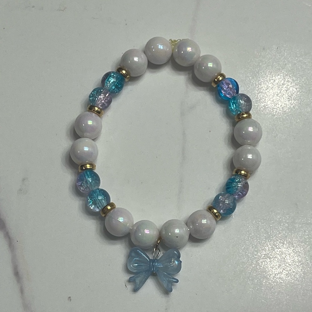 White and Blue Beaded Bracelet with bow Charm